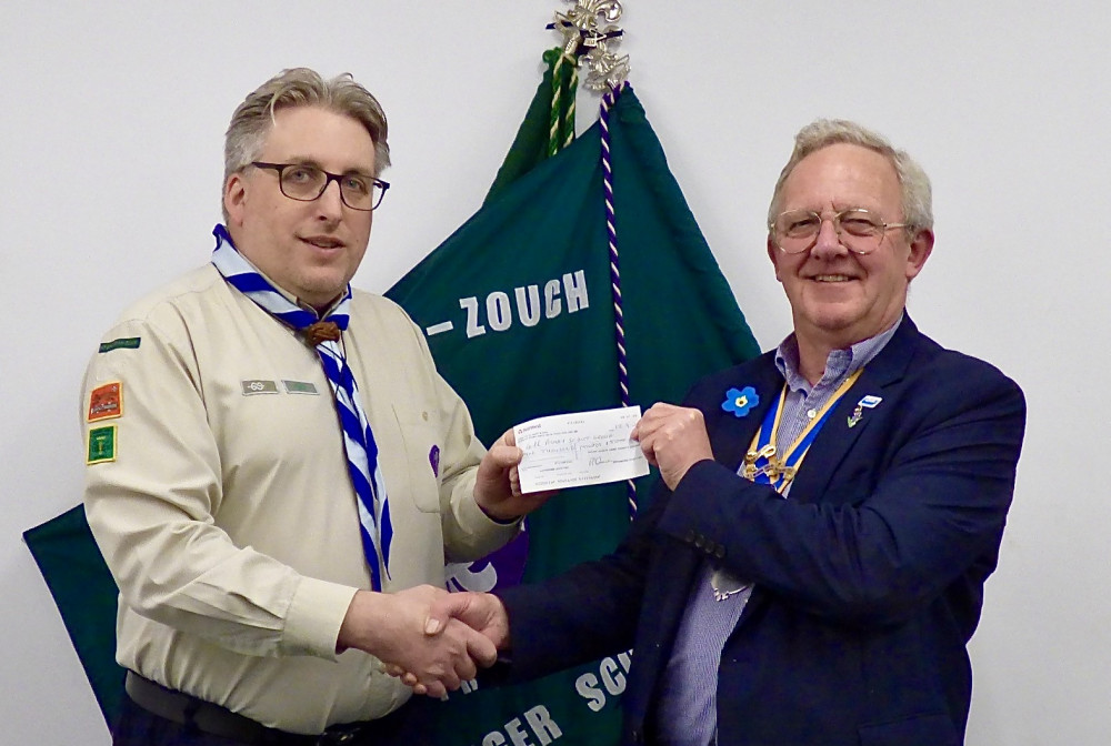 Group Scout Leader John Bloor receives the cheque from Paul Cook, President of Ashby Rotary Club. Photos: Supplied